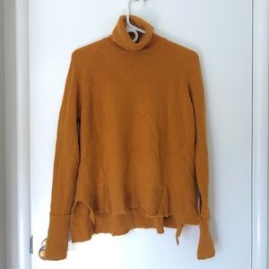 J Crew turtleneck sweater.
